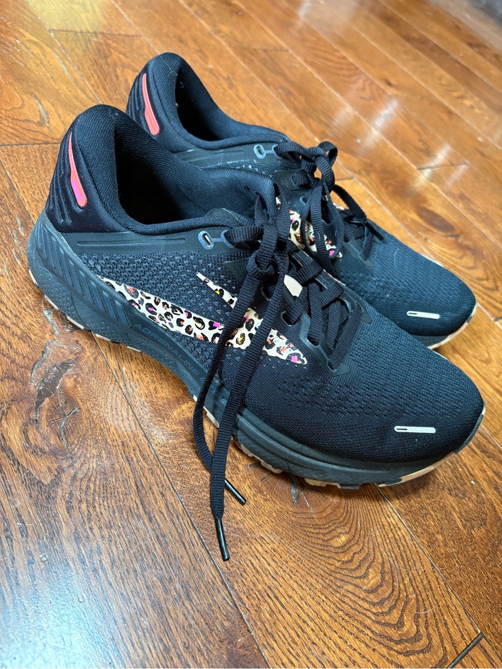 Brooks Women's Black Running Shoes with Leopard Accent and Pink Highlights